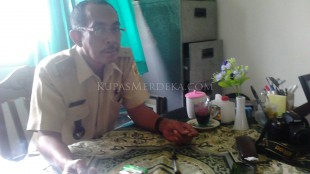 Santoso, Kades Sukaharja, Bogor, yang juga Ketua Paguyuban Linmas Kabupaten Bogor. (dok. KM)