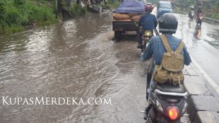 Jalan Raya Kemang-Parung yang kerap tergenang saat hujan tiba (dok. KM)