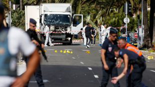 French police secure the area as the investigation continues at the scene near the heavy truck that ran into a crowd at high speed killing scores who were celebrating the Bastille Day July 14 national holiday on the Promenade des Anglais in Nice, France, July 15, 2016. Â© Eric Gaillard / Reuters