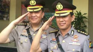 Kabid Humas polda Metro Jaya Awi Setiono (kanan)