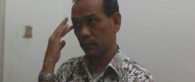 Kepala Dinsosnakertrans Kab. Bogor Yos Sudrajat saat di wawancara awak media (dok. KM)