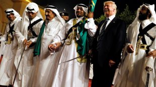 U.S. President Donald Trump dances with a sword as he arrives to a welcome ceremony by Saudi Arabia's King Salman bin Abdulaziz Al Saud at Al Murabba Palace in Riyadh, Saudi Arabia May 20, 2017 Â© Jonathan Ernst / Reuters