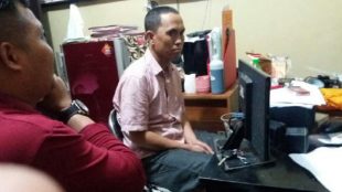Mantan Anggota DPRD Depok Ervan Teladan saat di BAP Polres Depok (dok.KM)
