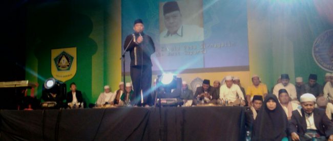 Kades Sirnagalih Amat Suparta saat memberikan sambutan pada Tabligh Akbar perayaan Tahun BAru Islam 1439H, Senin 2/10 (dok. kM)
