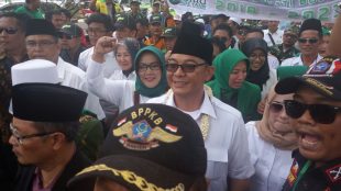 Paslon AMY dan Iwan Setiawan usai acara deklarasi menuju ke kantor KPU Kabupaten Bogor, Selasa 9/1 (dok. KM)