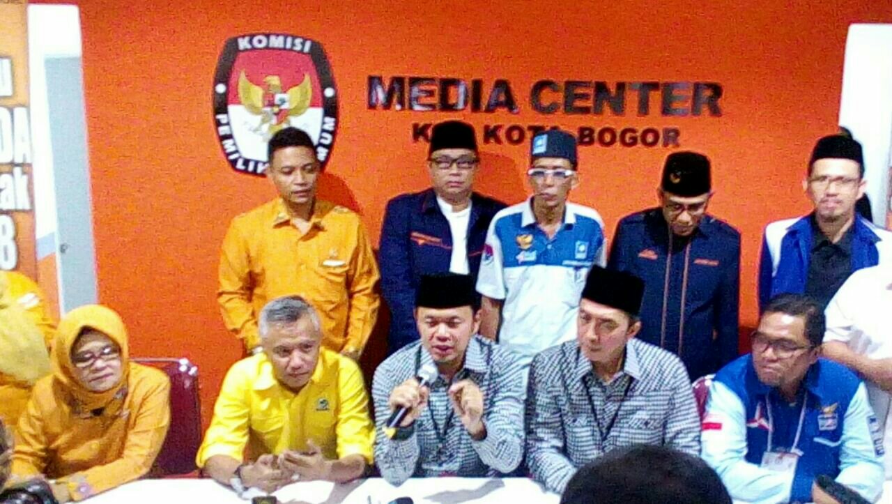 Pasangan Calon Walikota dan Wakil Walikota Bogor Bima Arya dan Dedie Rachim di KPUD Kota Bogor, Rabu 10/1 (dok. KM) 