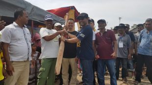 Anggota DPR Nasir Djamil membuka lomba perahu dayung "Lomba Kayoh Jalo" di Langsa, Minggu 26/8/2018 (dok. KM)