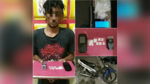 Tersangka pengedar sabu beserta alat bukti diamankan di Polsek Langsa Kota, Minggu 12/8 (dok. KM)