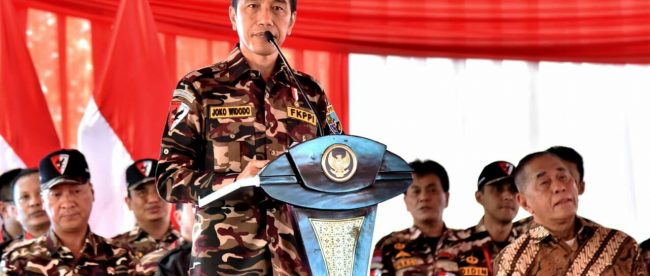 Presiden Joko Widodo saat meresmikan pembukaan Jambore Kebangsaan Bela Negara Keluarga Besar Forum Komunikasi Putra Putri TNI-Polri (FKPPI) 2018 di Bumi Perkemahan Ragunan, Jakarta Selatan, pada Jumat, 7 Desember 2018.