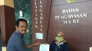 Laporan Kantor Hukum Irawan Firja dan Rekan ke Komisi Yudisial dan Badan Pengawas Mahkamah Agung (dok. KM)