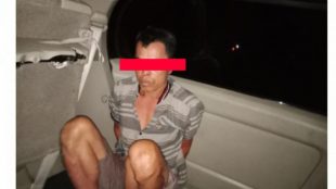 Tsk Wi (42),saat di amankan aparat polisi pada Jum'at (22/01). Sumber foto: wartaprima.com